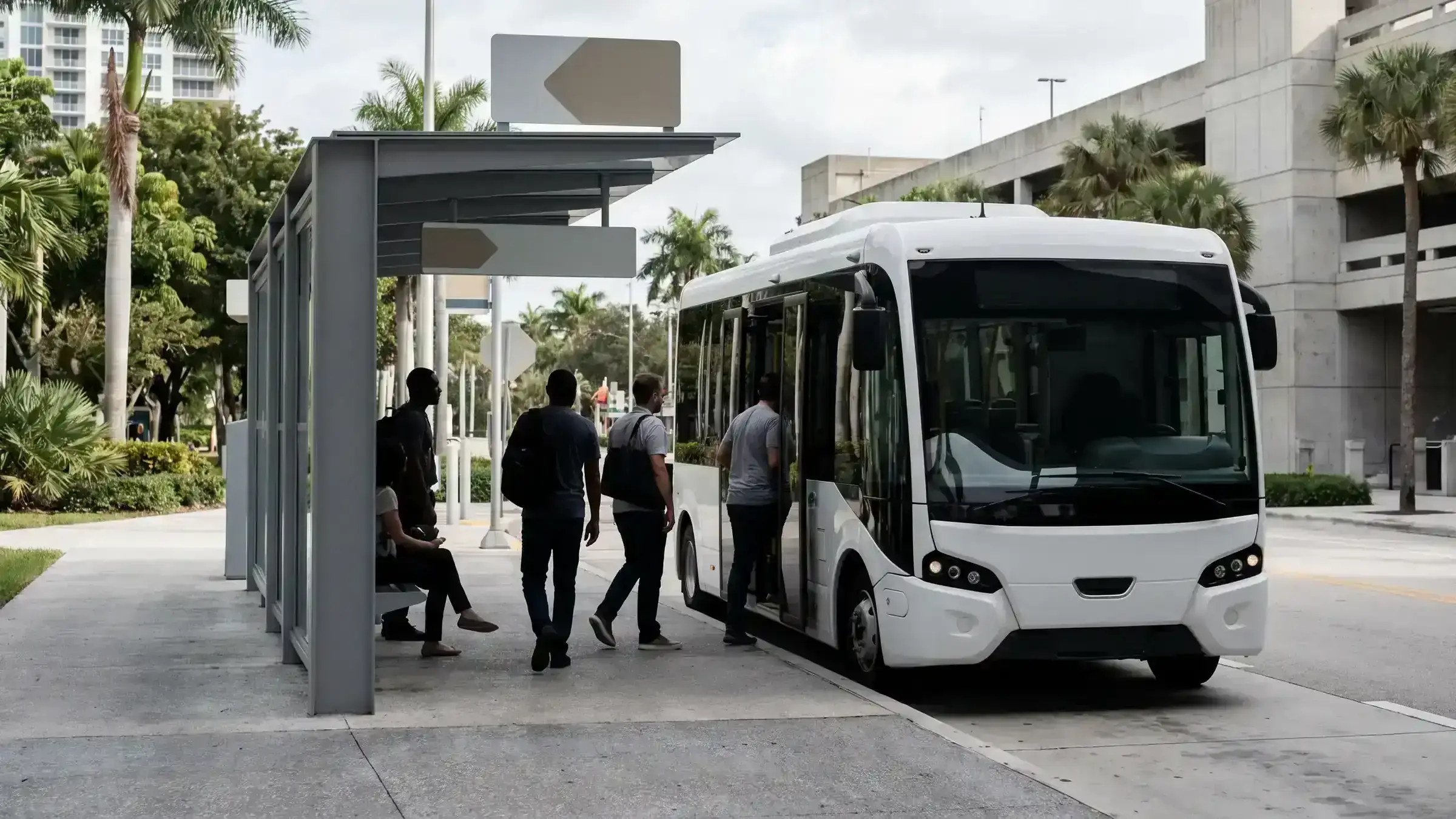 Riders boarding a public bus on a city street
